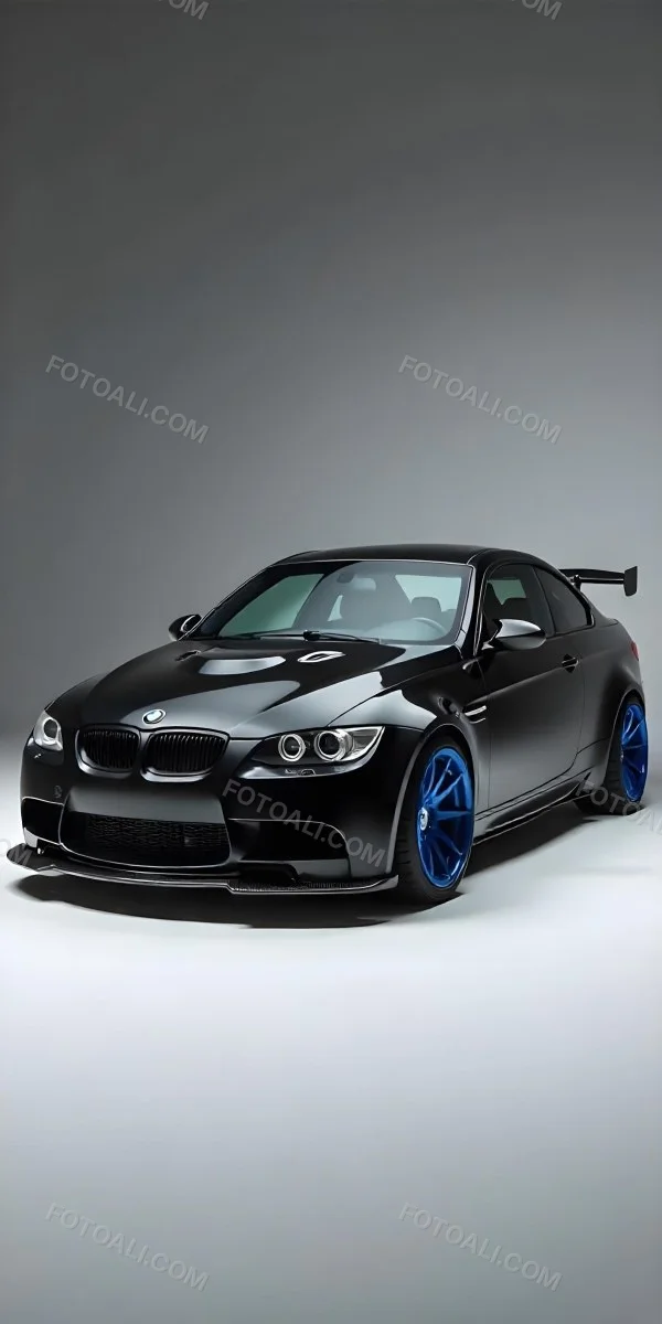 A Black Bmw M3 E92 With A Wide Body Kit Blue Rims And A Carbon Fiber Front Lip Studio Background 17 Bb38