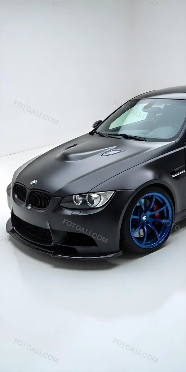 A Black Bmw M3 E92 With A Wide Body Kit Blue Rims And A Carbon Fiber Front Lip Studio Background 28 251f