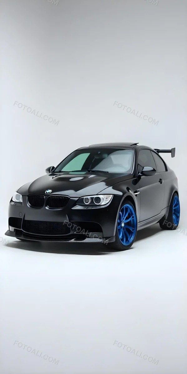 A Black Bmw M3 E92 With A Wide Body Kit Blue Rims And A Carbon Fiber Front Lip Studio Background 7 964b