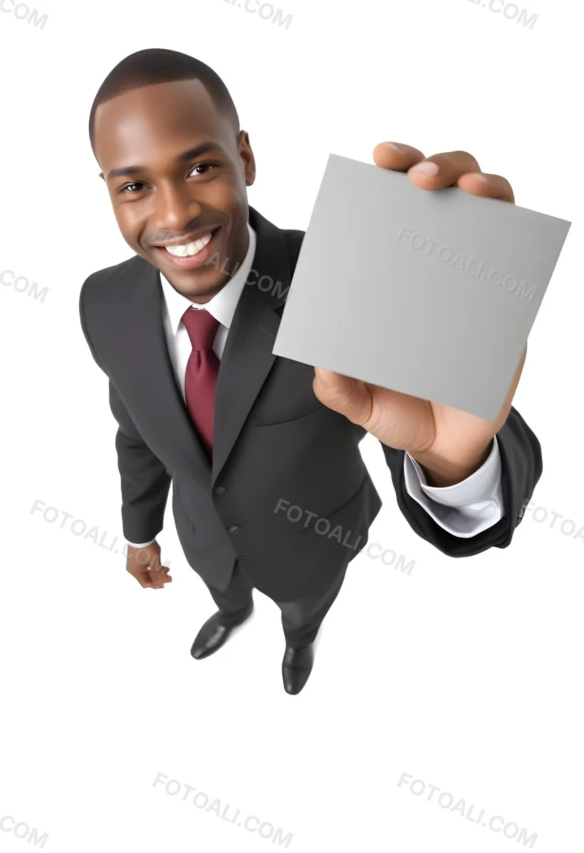 A Black Man In A Business Suit Approximately 30 Years Old With Short Hair And A Friendly Smile He Is Holding A Blank Gray Square In Front Of Him The Background Is Plain White Emphasizing The Subject 25 42f3