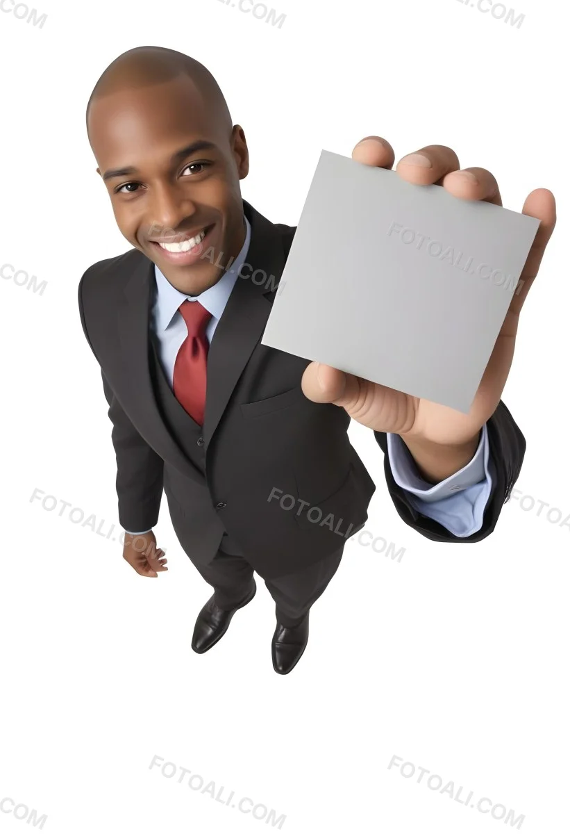 A Black Man In A Business Suit Approximately 30 Years Old With Short Hair And A Friendly Smile He Is Holding A Blank Gray Square In Front Of Him The Background Is Plain White Emphasizing The Subject 4 5dc2