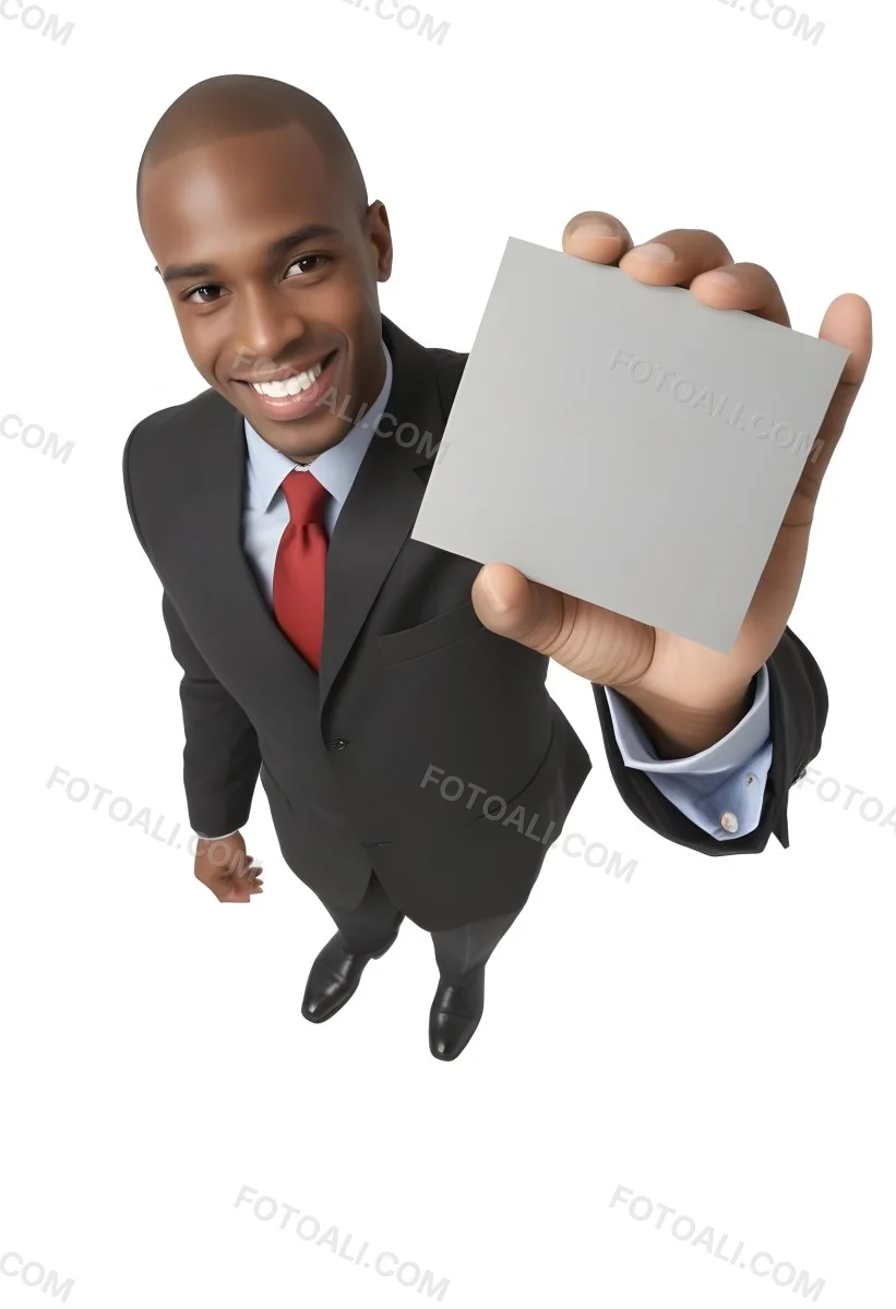 A Black Man In A Business Suit Approximately 30 Years Old With Short Hair And A Friendly Smile He Is Holding A Blank Gray Square In Front Of Him The Background Is Plain White Emphasizing The Subject 8 434b