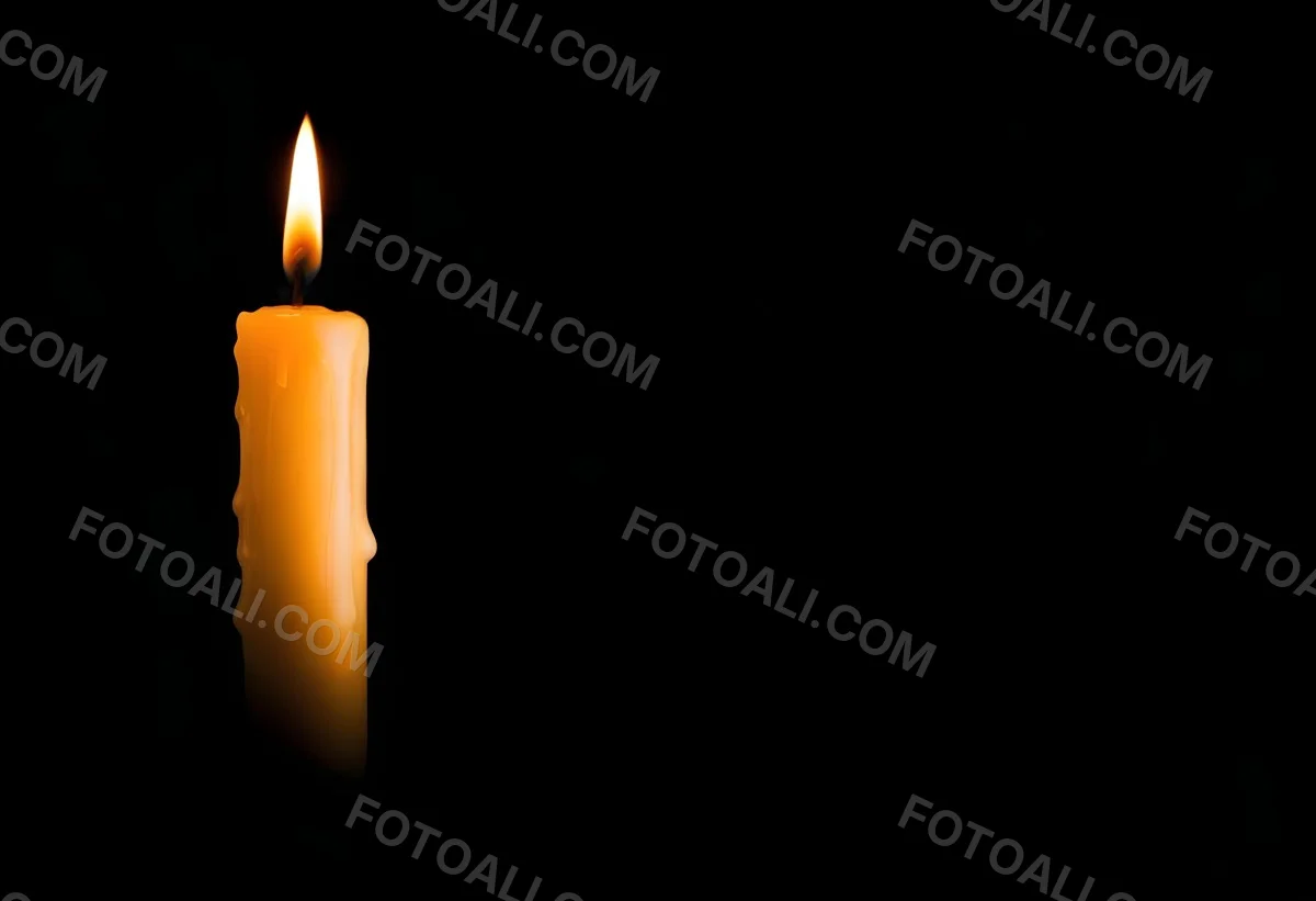 A Burning Candle With A Bright Flame The Wax Is Dripping Down The Side Casting A Warm Glow In A Dark Room 9 D51e