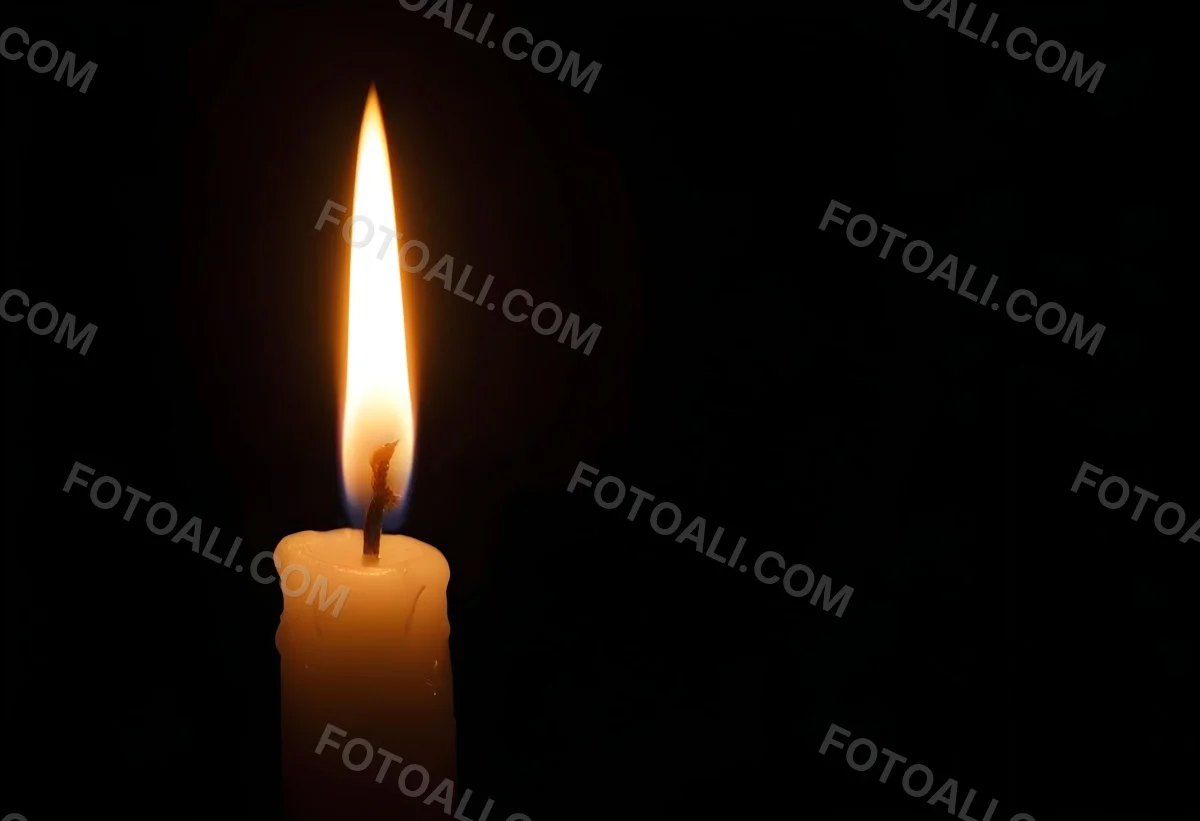 A Candle With A Bright Flame Casting A Warm Glow In The Darkness Creating A Sense Of Hope And Remembrance On A Black Background 12 496b