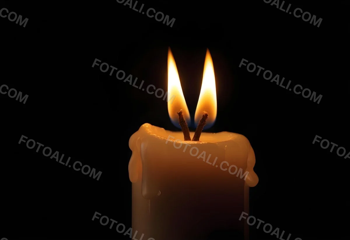 A Candle With A Bright Flame Casting A Warm Glow In The Darkness Creating A Sense Of Hope And Remembrance On A Black Background 21 4666
