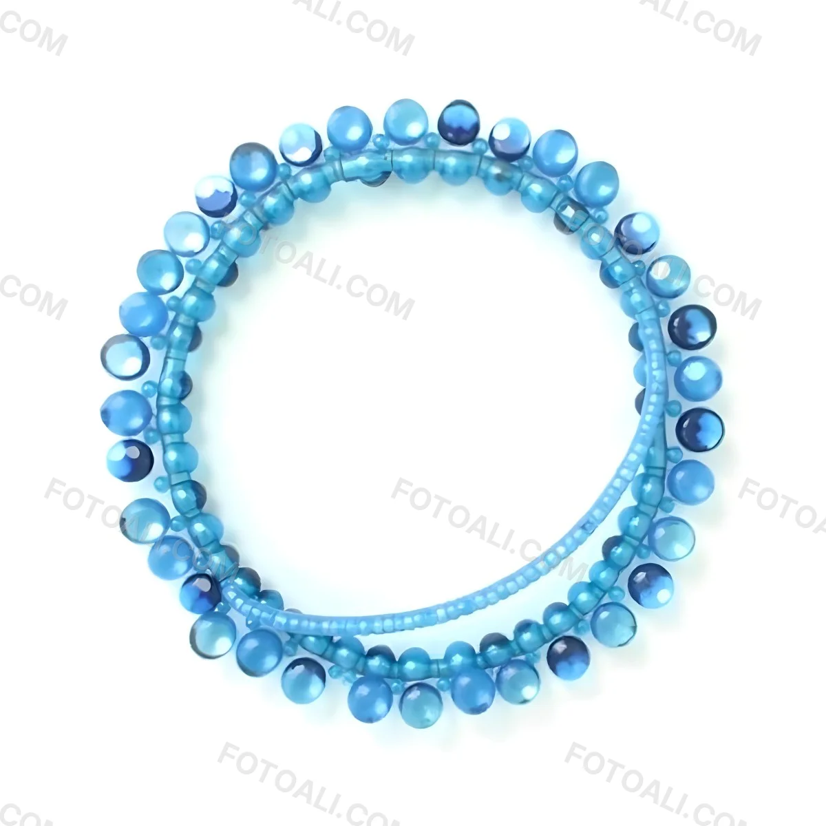 A Circular Arrangement Of Blue Gemstones Or Beads Against A White Background 11 9f7a