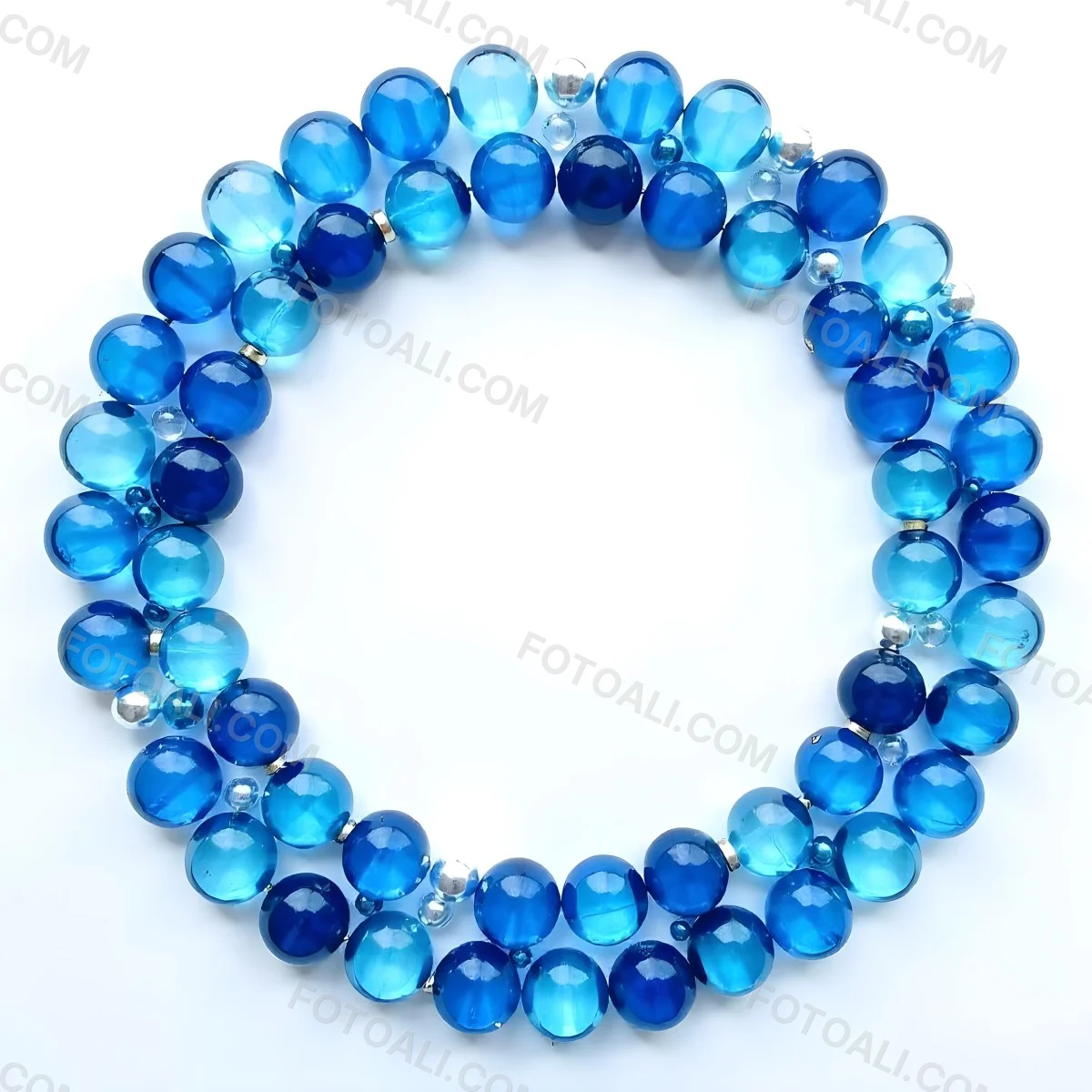 A Circular Arrangement Of Blue Gemstones Or Beads Against A White Background 5 5912