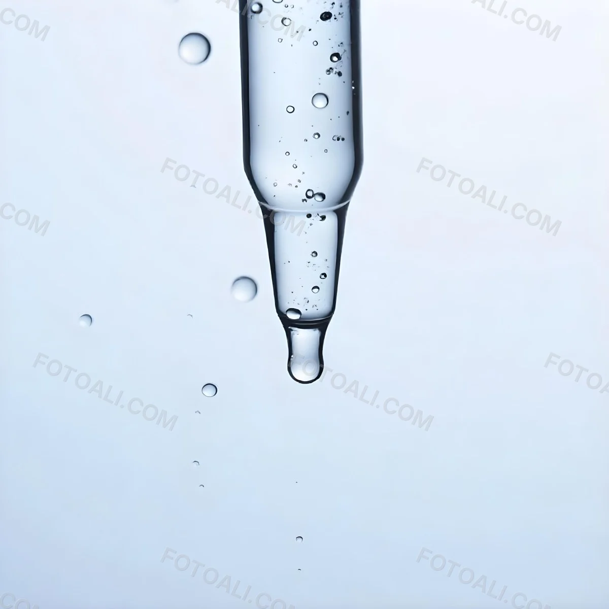 A Close Up Of A Glass Pipette With Water Droplets Against A Blue Background 8 Bafb