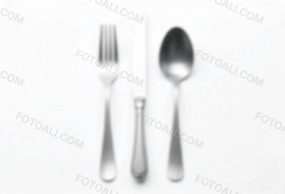 A Fork A Knife And A Spoon Made Of Stainless Steel On A White Background 23 1e33