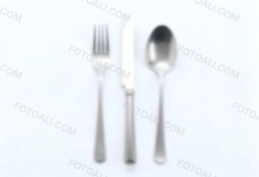 A Fork A Knife And A Spoon Made Of Stainless Steel On A White Background 26 Ae88
