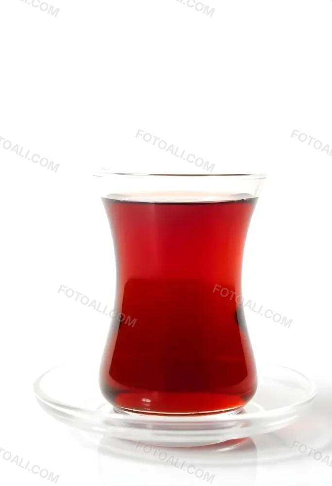 A Glass Of Red Tea On A Glass Saucer White Background 7 57f8