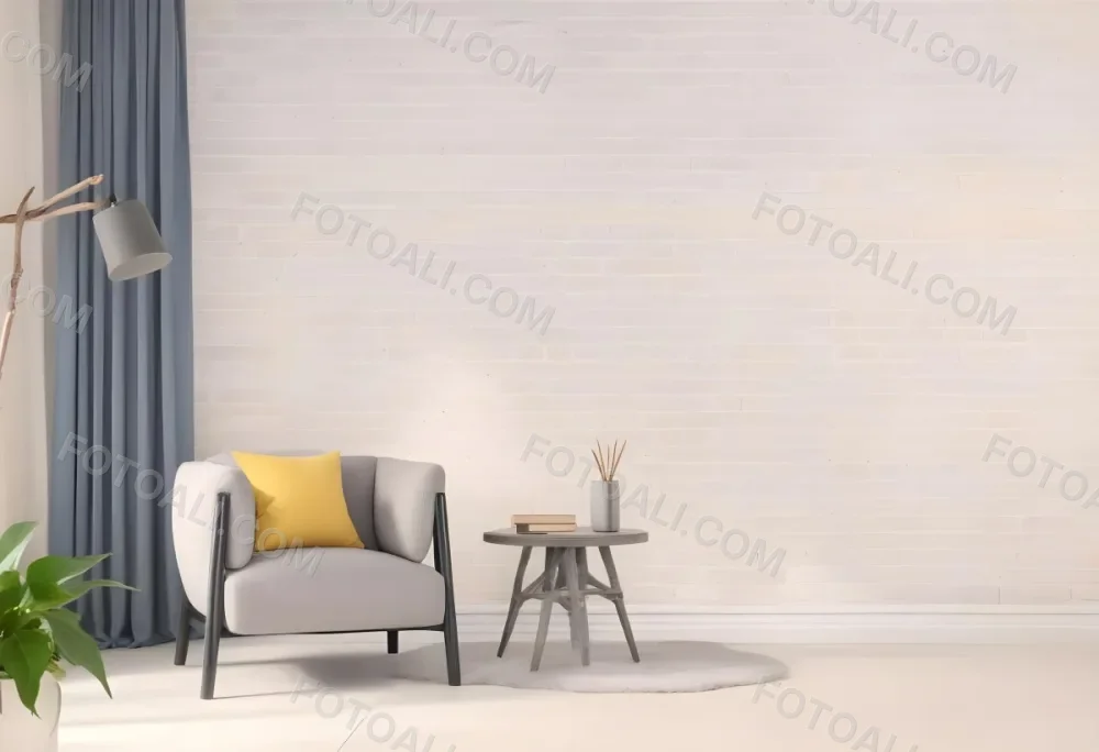 A Gray Armchair With A White Pillow Next To A Small Table With A Book And Some Sticks In A Yellow Room 2 9671