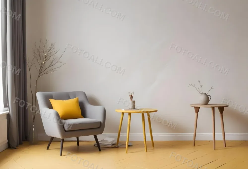 A Gray Armchair With A White Pillow Next To A Small Table With A Book And Some Sticks In A Yellow Room 20 2358