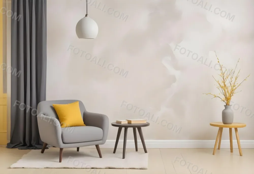 A Gray Armchair With A White Pillow Next To A Small Table With A Book And Some Sticks In A Yellow Room 7 Bcc9