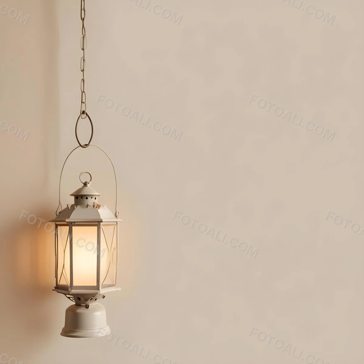 A Hanging Lantern With A Warm Glowing Light Against A Plain Beige Wall 56 898b
