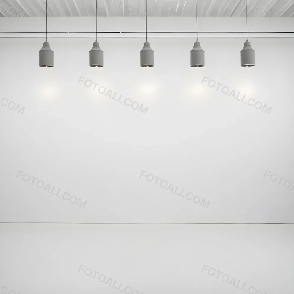 A Minimalist White Room With A High Ceiling And Hanging Pendant Lights 23 Ada2