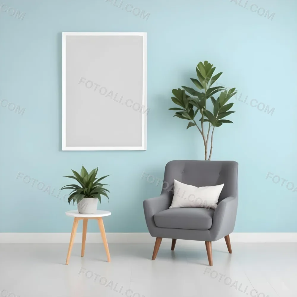 A Modern Living Room With A Gray Armchair A White Framed Wall Art And A Wooden Side Table With A Potted Plant 21 1d03