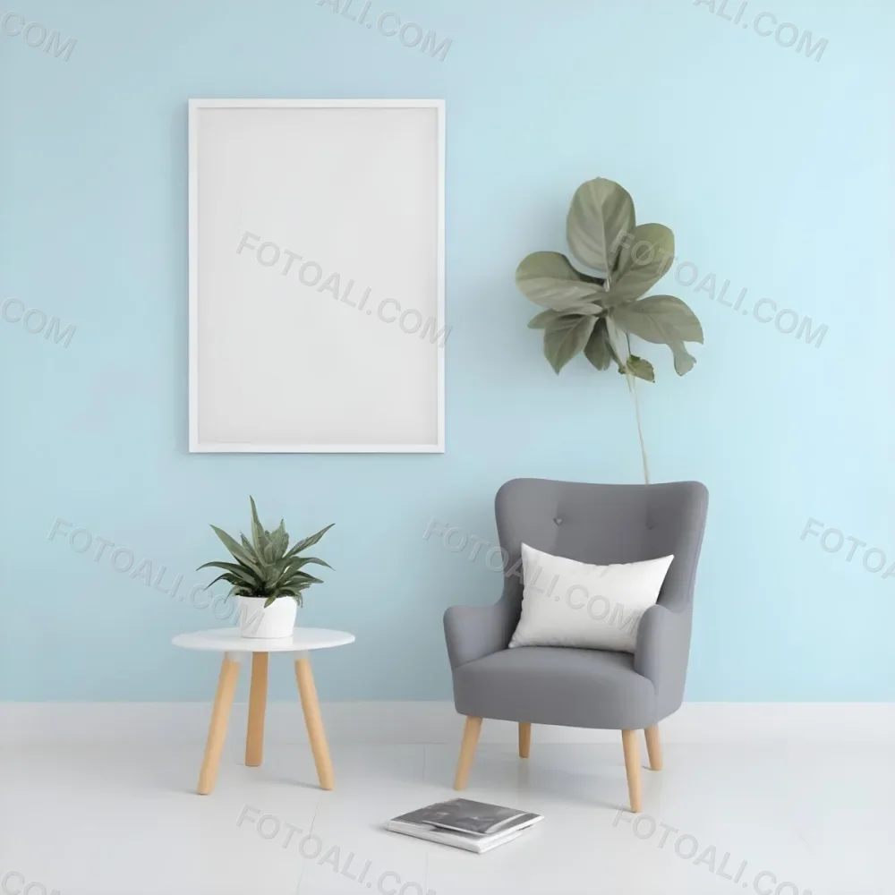 A Modern Living Room With A Gray Armchair A White Framed Wall Art And A Wooden Side Table With A Potted Plant 61 Fb20