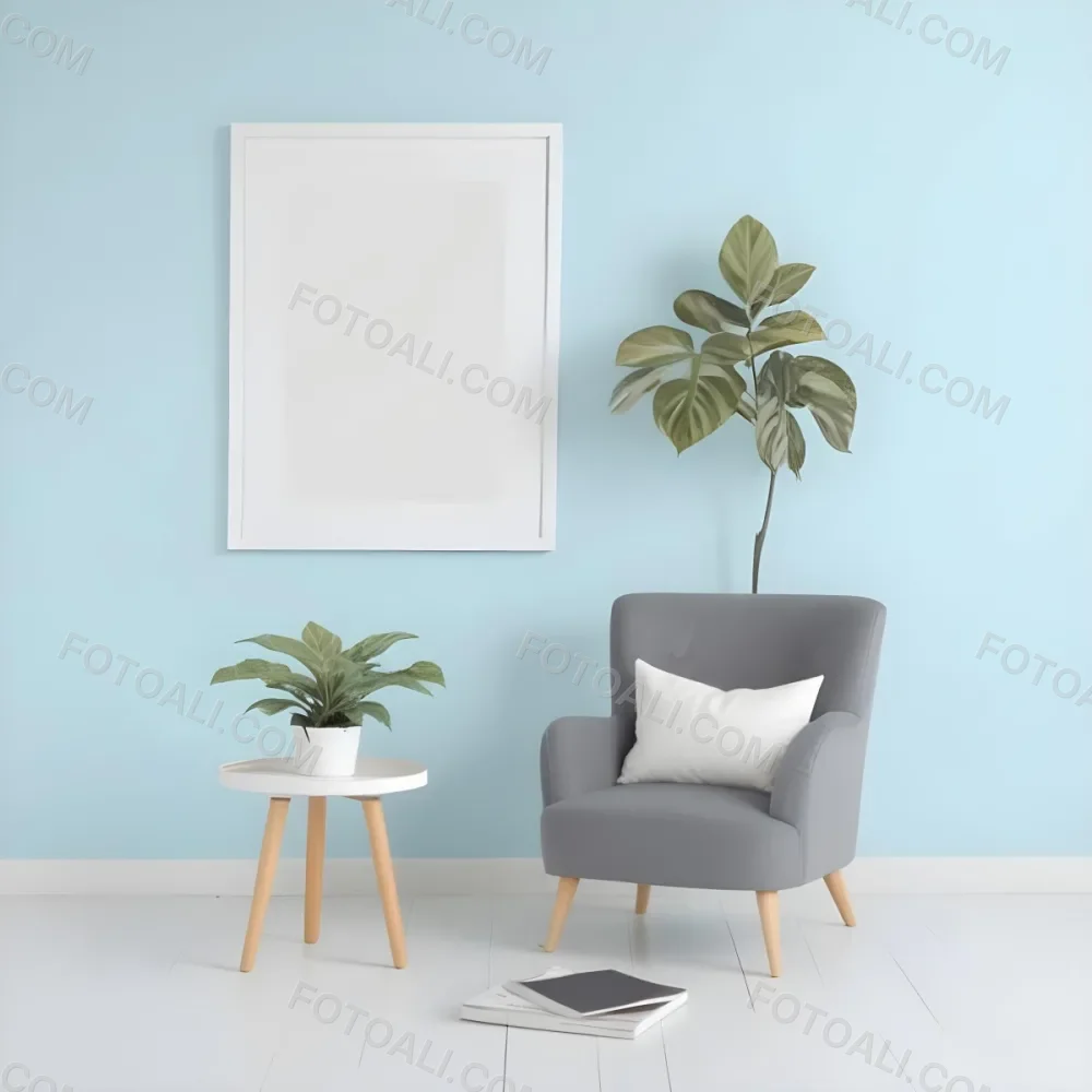 A Modern Living Room With A Gray Armchair A White Framed Wall Art And A Wooden Side Table With A Potted Plant 63 Cd5e