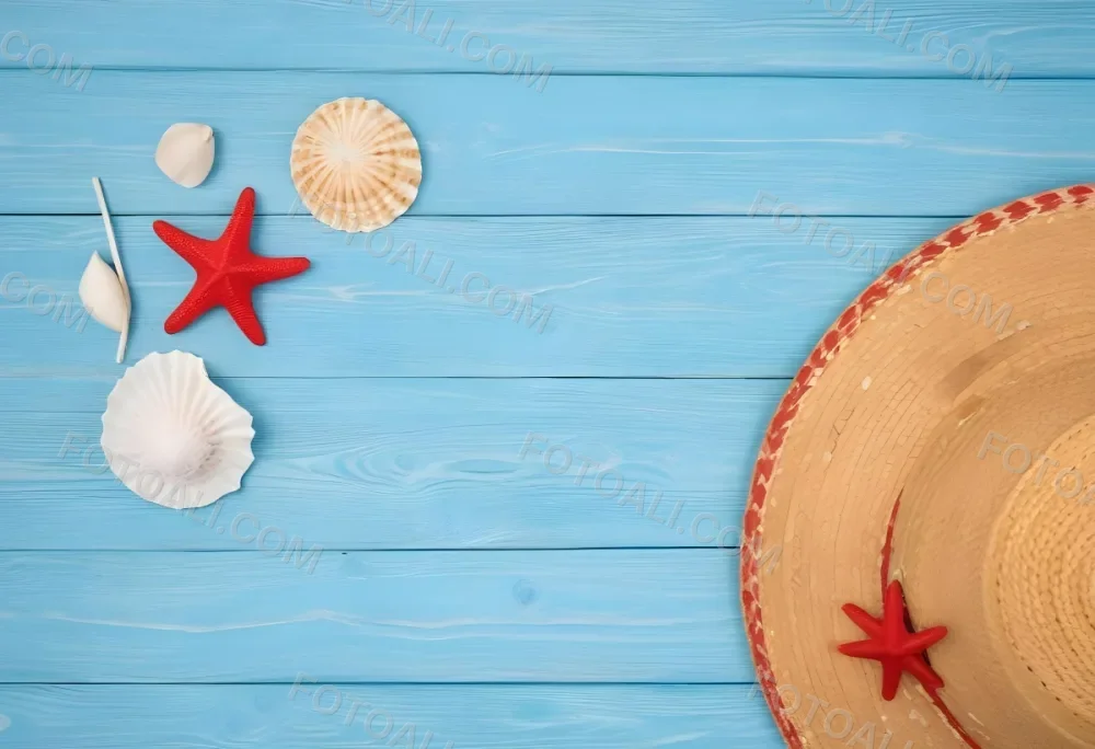 A Red Starfish Seashells And A Straw Hat On A Blue Wooden Background Summer Vacation Concept Beach Theme Top View Flat Lay 19 4f68