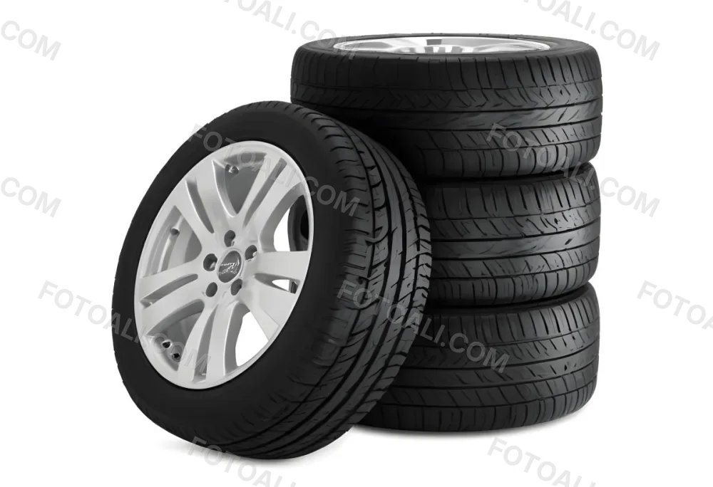 A Stack Of Four Black Tires With Black Rims One Tire Is Leaning Against The Stack The Background Is Black 3 312d