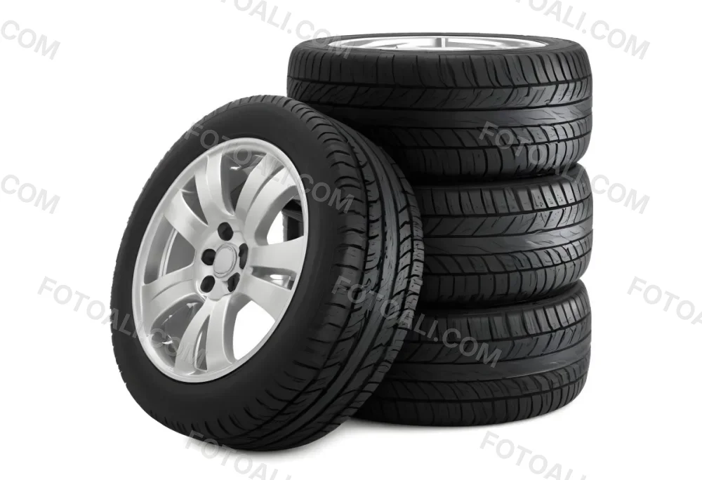 A Stack Of Four Black Tires With Black Rims One Tire Is Leaning Against The Stack The Background Is Black 5 0bc1