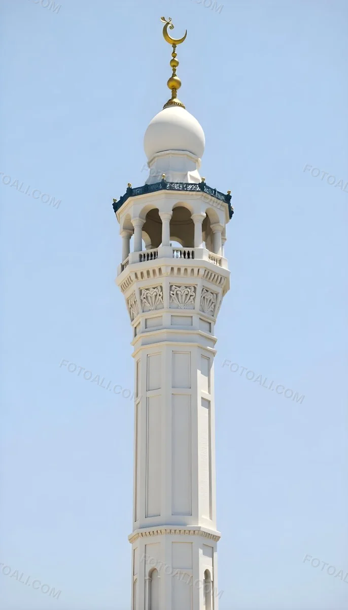 A Tall White Minaret With Blue Roof And Intricate Details Against A Clear Blue Sky Showcasing Islamic Architecture And Design 23 10bd