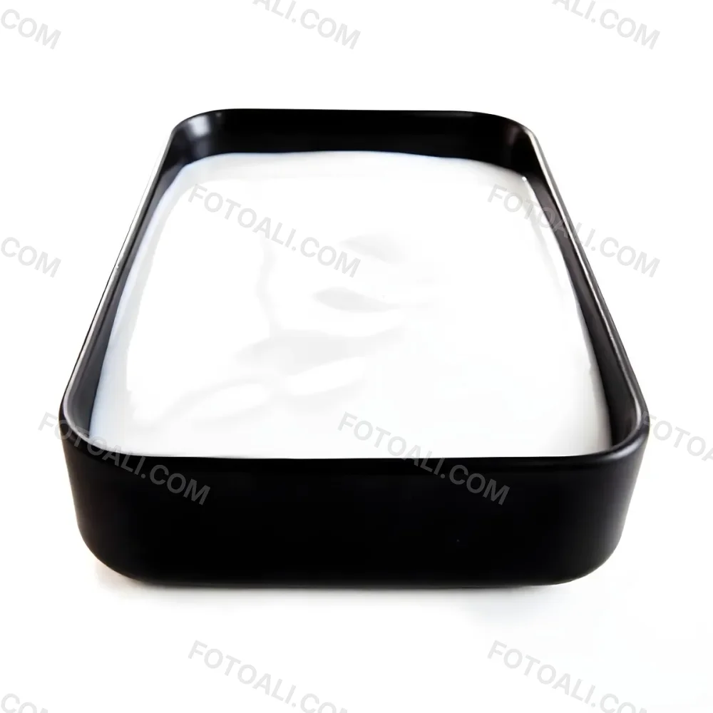 A White Square Plate With Rounded Corners Filled With White Liquid On A White Background 2 A163