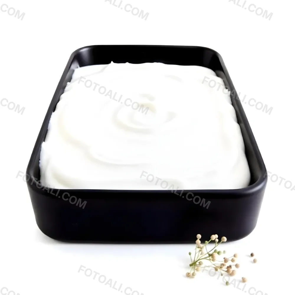 A White Square Plate With Rounded Corners Filled With White Liquid On A White Background 4 E94c