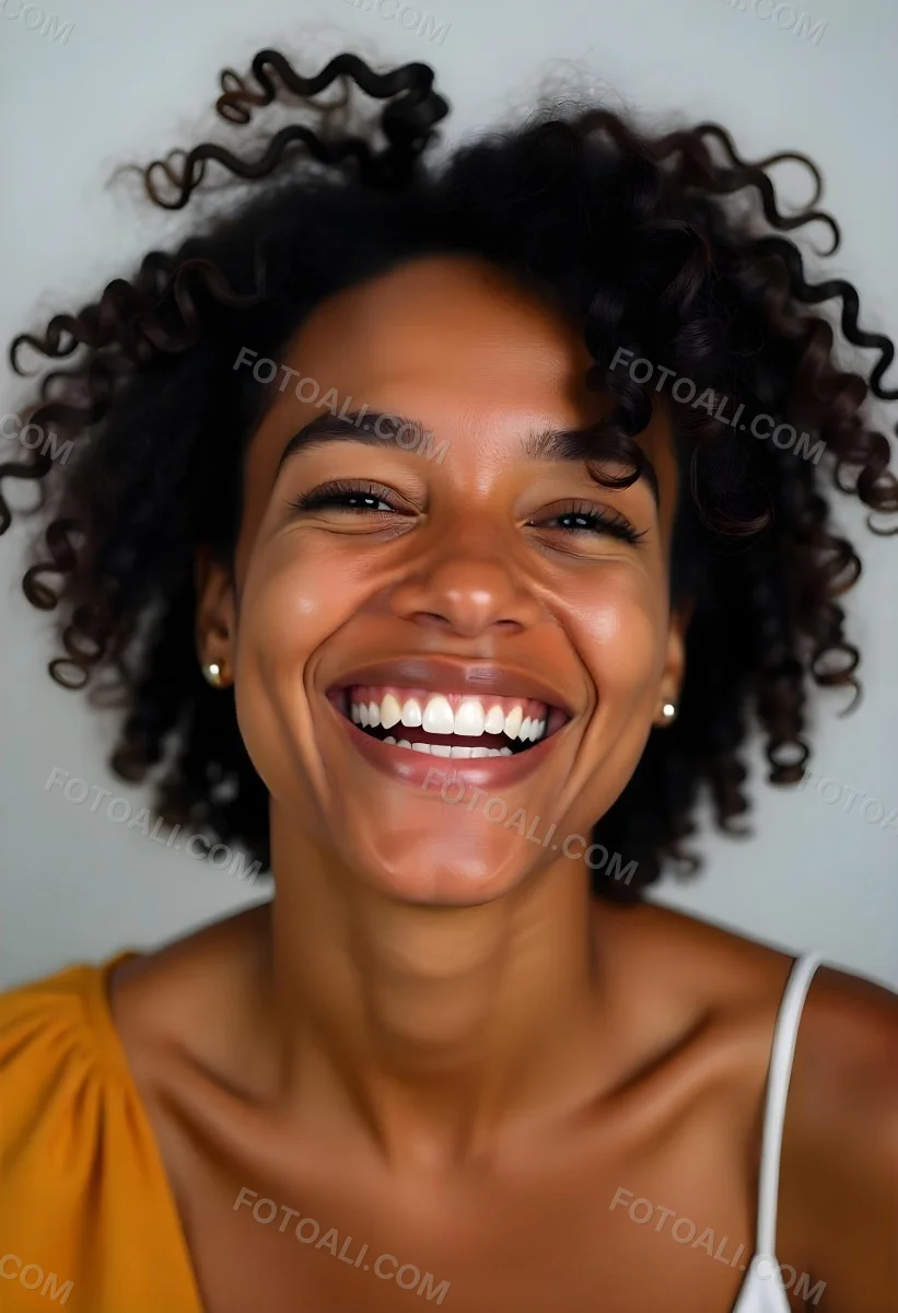A Young Black Woman With Curly Dark Hair And A Warm Friendly Smile 26 89d7