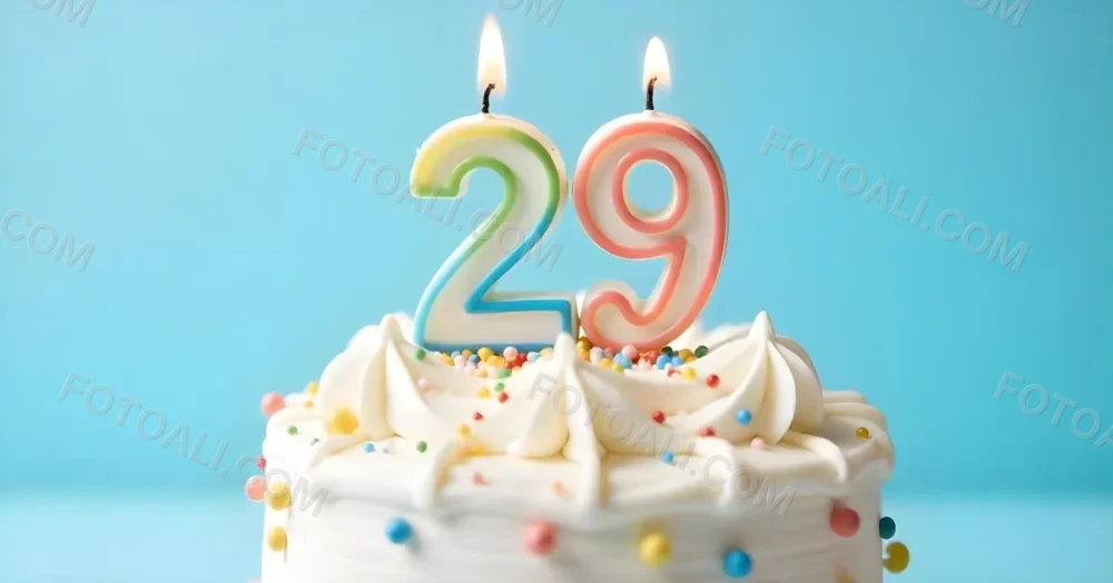 Birthday Cake With White Frosting And Colorful Sprinkles A Candle In The Shape Of The Number 29 Light Blue Background 11 234b