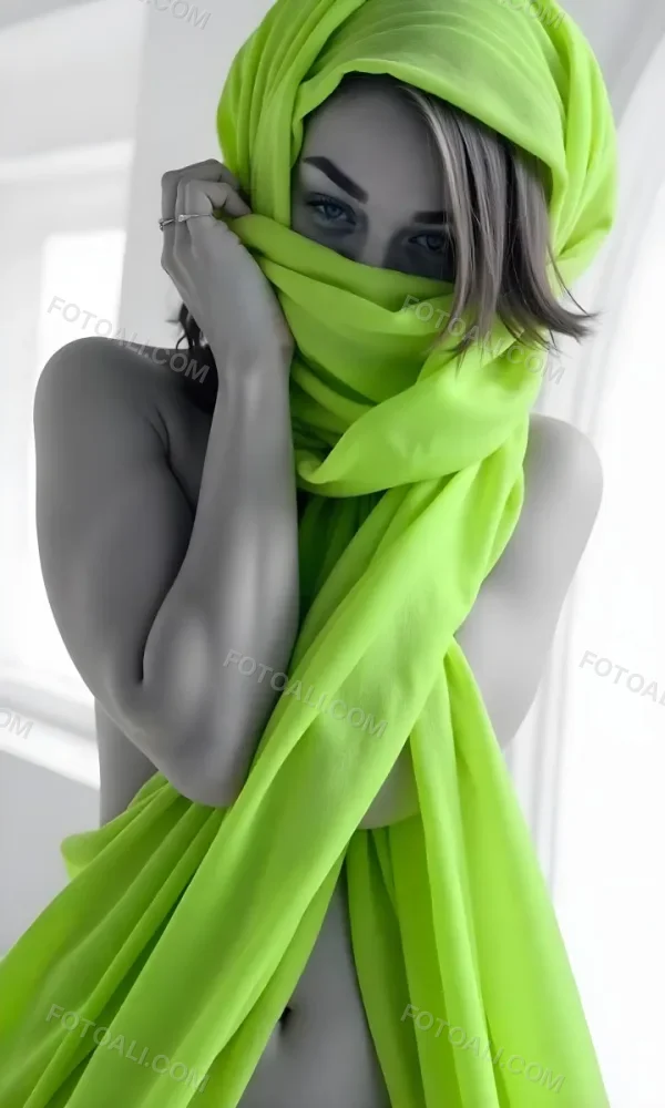 Caucasian Woman Age 25 With Brown Hair Partially Covered By A Vibrant Green Fabric In A Minimalist Gray And White Indoor Setting 8 59d1