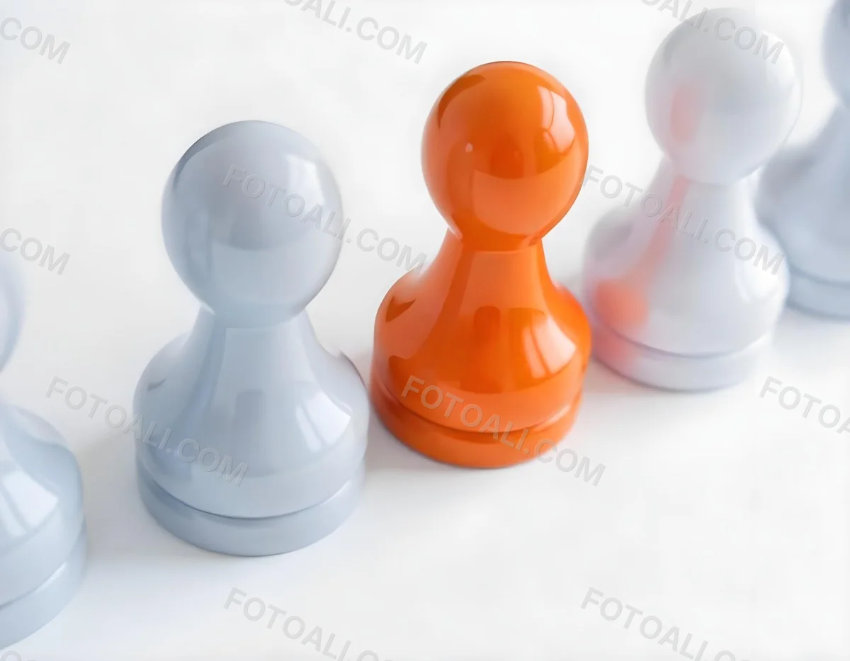 Three Game Pieces One Orange And Two Gray On A White Background 1 8ddd