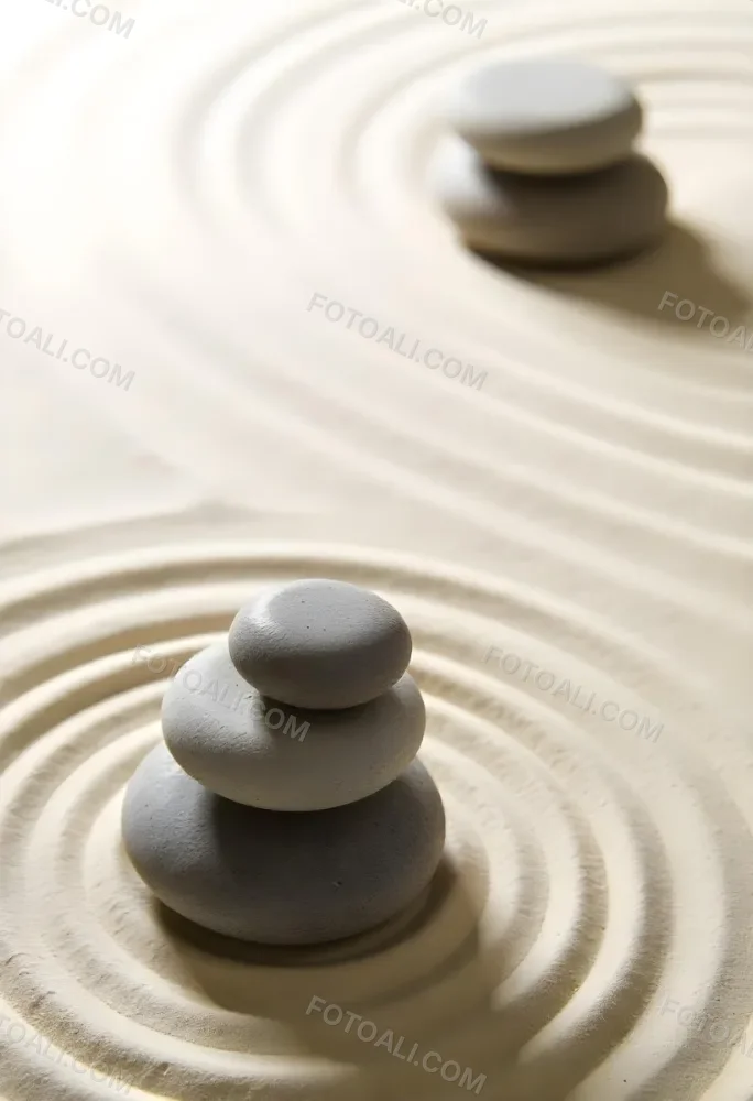 Three Stacked Stones On Sand With Concentric Circles The Background Is Made Of Sand With Parallel Circles 8 3b7f