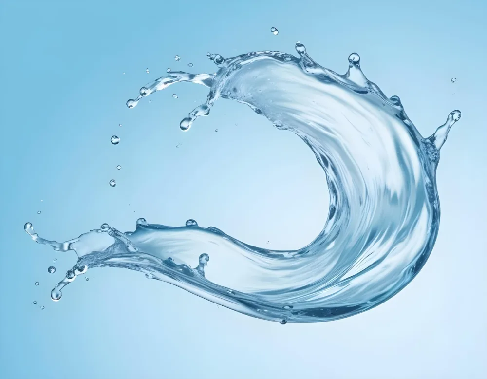 A Splash Of Water In The Shape Of A Wave Or Wing Against A Blue Background 27 1e6a