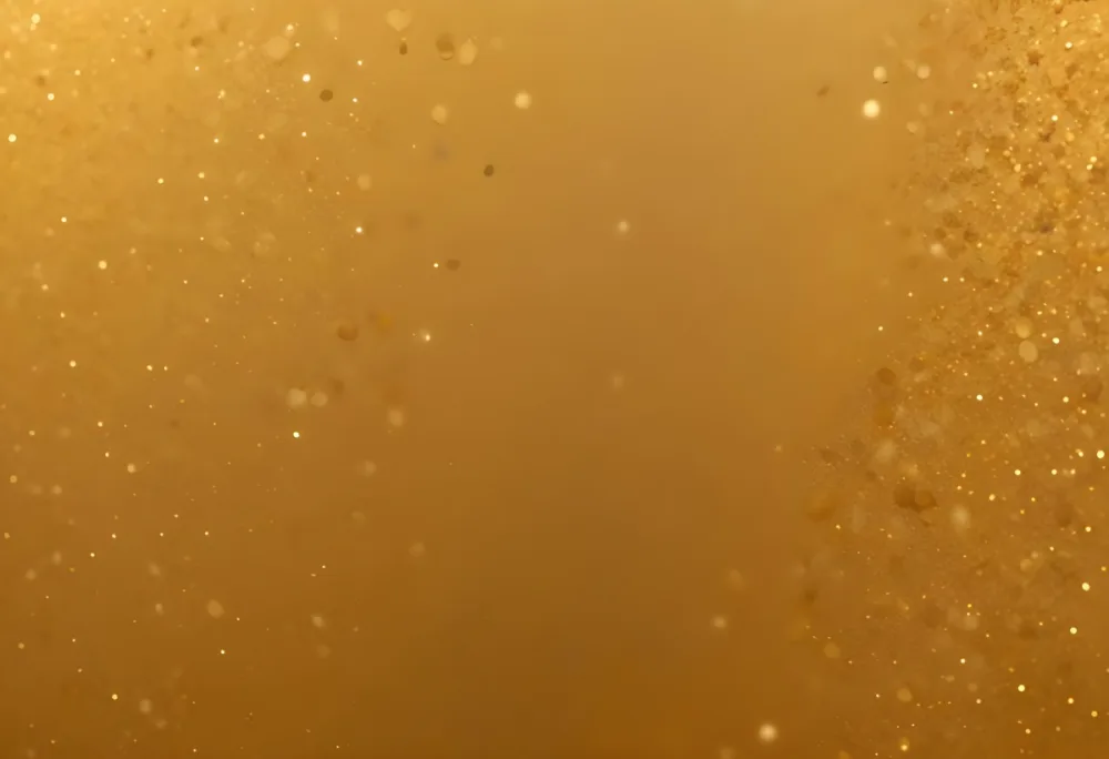 A Close Up Image Of A Golden Glittery Surface With A Textured Granular Appearance 122 D319