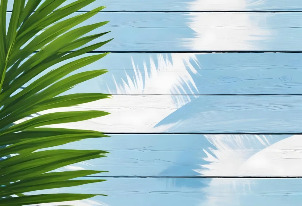 A Green Palm Leaf On A Blue And White Wooden Background The Leaf Is On The Left Side Of The Image 13 8ca8