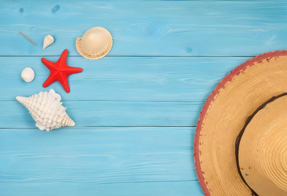 A Red Starfish Seashells And A Straw Hat On A Blue Wooden Background Summer Vacation Concept Beach Theme Top View Flat Lay 20 E5f9