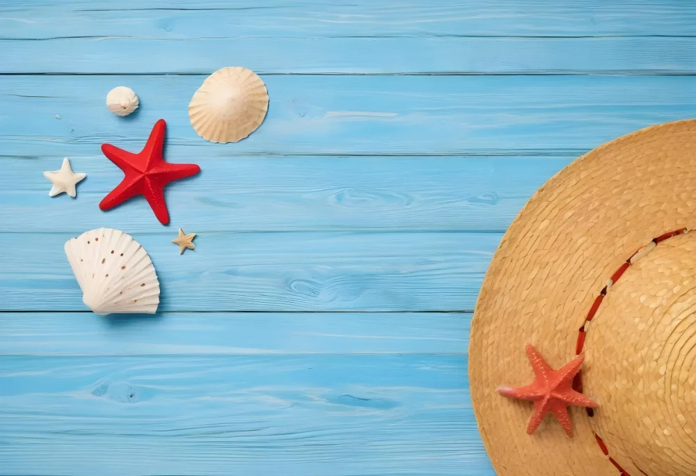 A Red Starfish Seashells And A Straw Hat On A Blue Wooden Background Summer Vacation Concept Beach Theme Top View Flat Lay 8 F727