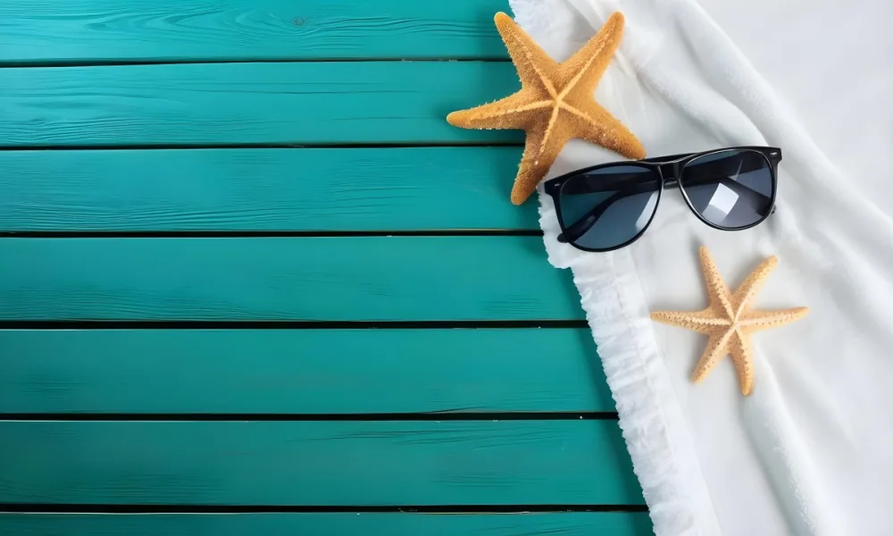 A Starfish And Sunglasses On A White Towel On A White Wooden Surface Beach Vacation Concept Summer Vacation Tropical Bright Colors High Angle View 5 D291