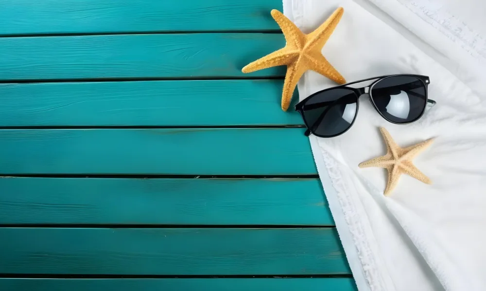 A Starfish And Sunglasses On A White Towel On A White Wooden Surface Beach Vacation Concept Summer Vacation Tropical Bright Colors High Angle View 7 22c9