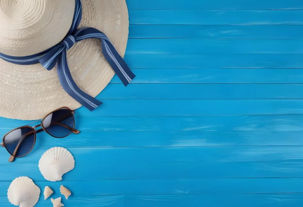 A Straw Hat With A Blue Ribbon Sunglasses And Seashells On A Blue Wooden Surface Summer Vacation Concept Beach Accessories Top View Flat Lay 14 C14d