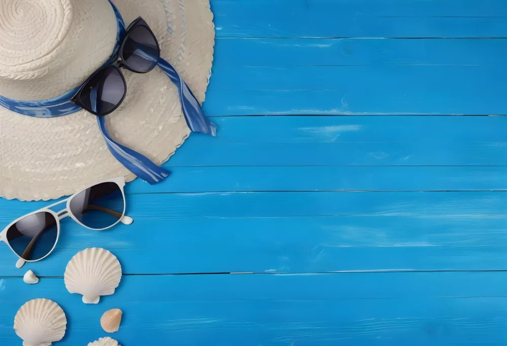 A Straw Hat With A Blue Ribbon Sunglasses And Seashells On A Blue Wooden Surface Summer Vacation Concept Beach Accessories Top View Flat Lay 23 5b5c