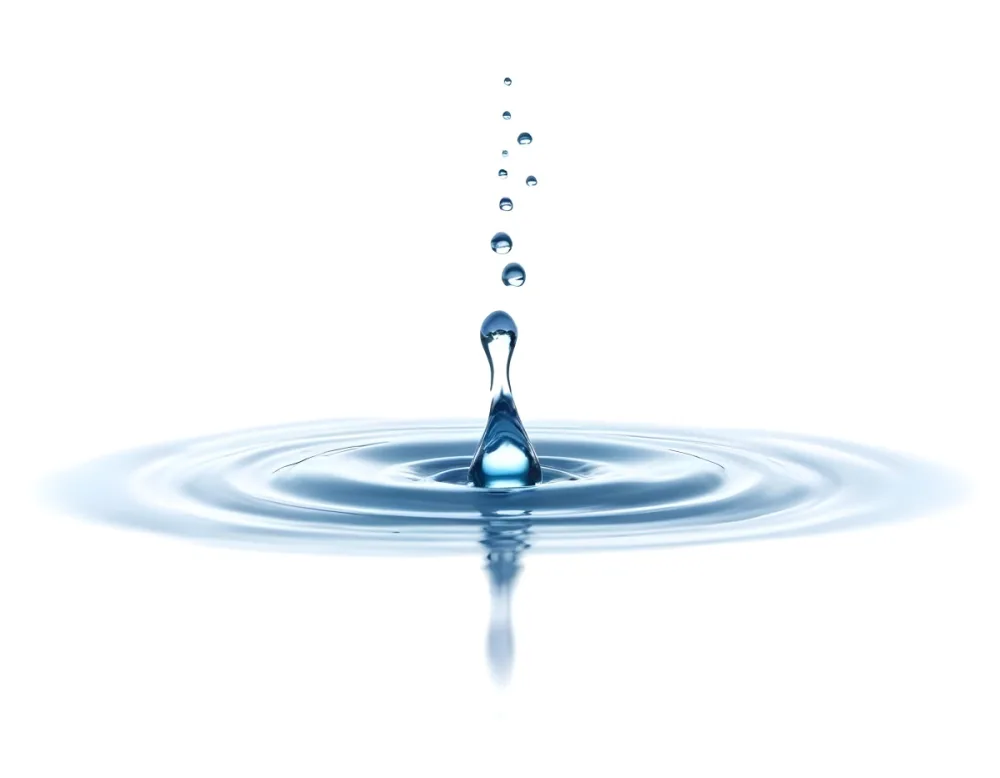 A Water Drop Falling Into A Body Of Water Creating Ripples Isolated On A White Background Studio Shot High Speed Photography 16 459a