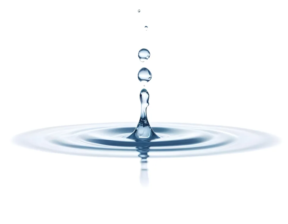 A Water Drop Falling Into A Body Of Water Creating Ripples Isolated On A White Background Studio Shot High Speed Photography 33 Db11