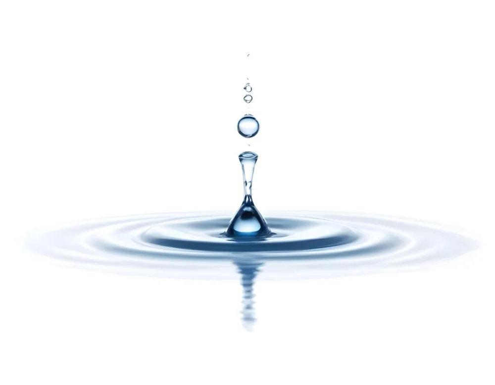 A Water Drop Falling Into A Body Of Water Creating Ripples Isolated On A White Background Studio Shot High Speed Photography 40 Be41