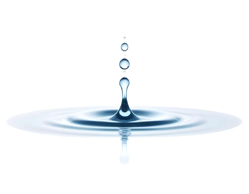 A Water Drop Falling Into A Body Of Water Creating Ripples Isolated On A White Background Studio Shot High Speed Photography 42 Ed13