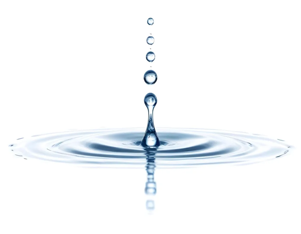 A Water Drop Falling Into A Body Of Water Creating Ripples Isolated On A White Background Studio Shot High Speed Photography 45 7296