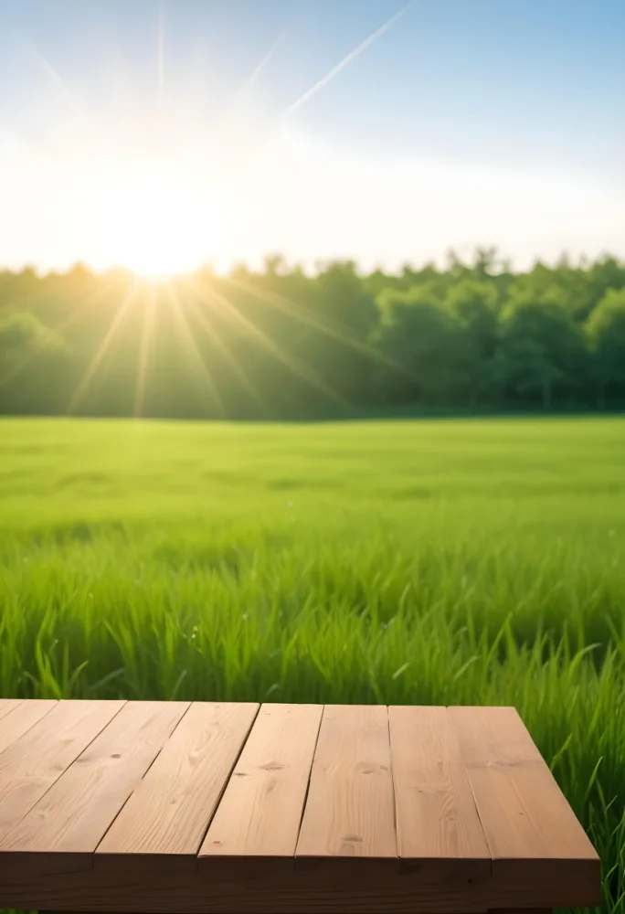 A Wooden Table With A Green Field In The Background The Sun Is Shining And The Sky Is Clear The Grass Is Green And Lush 26 Fa5a