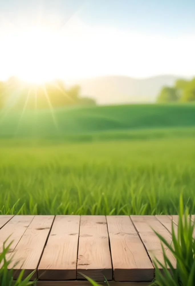 A Wooden Table With A Green Field In The Background The Sun Is Shining And The Sky Is Clear The Grass Is Green And Lush 39 E4ac